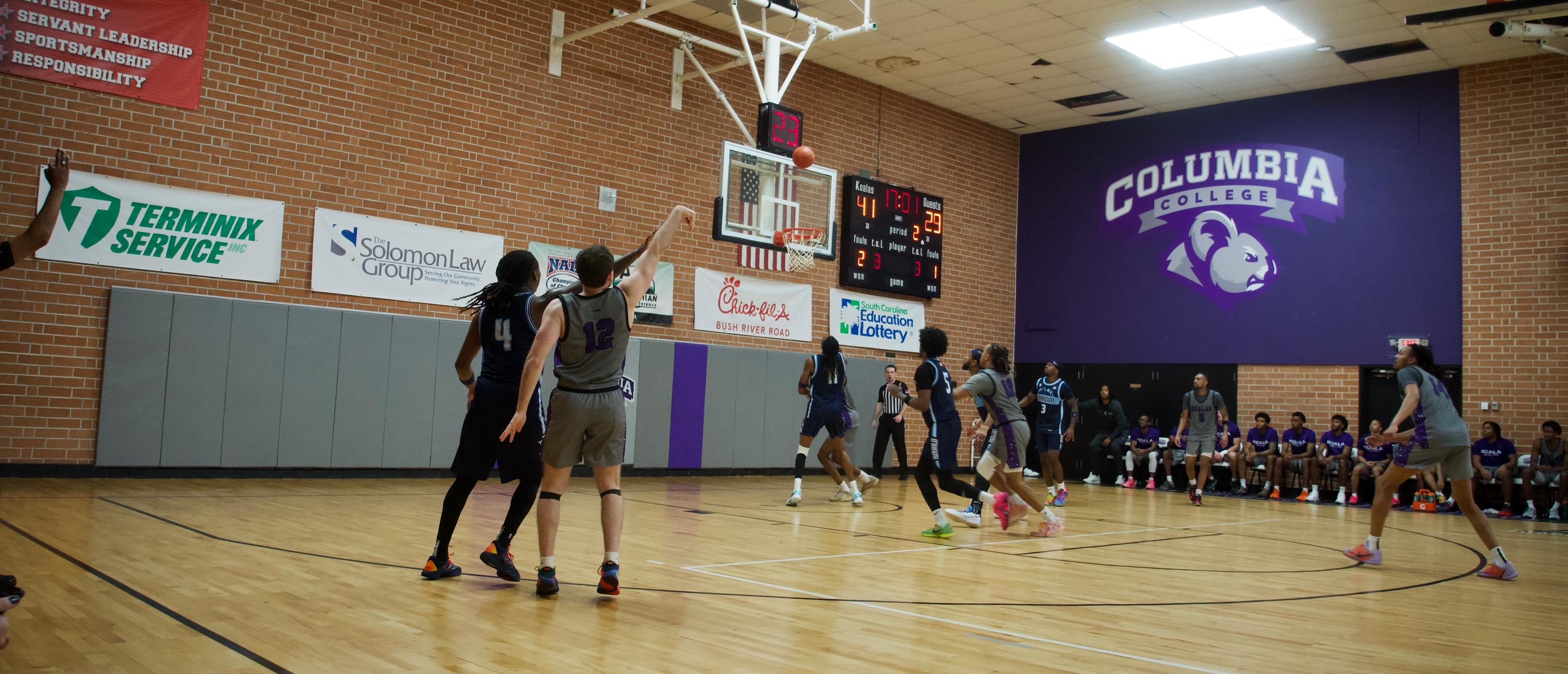 Austin Harrell shooting a 3, photo from Tamia Fripp