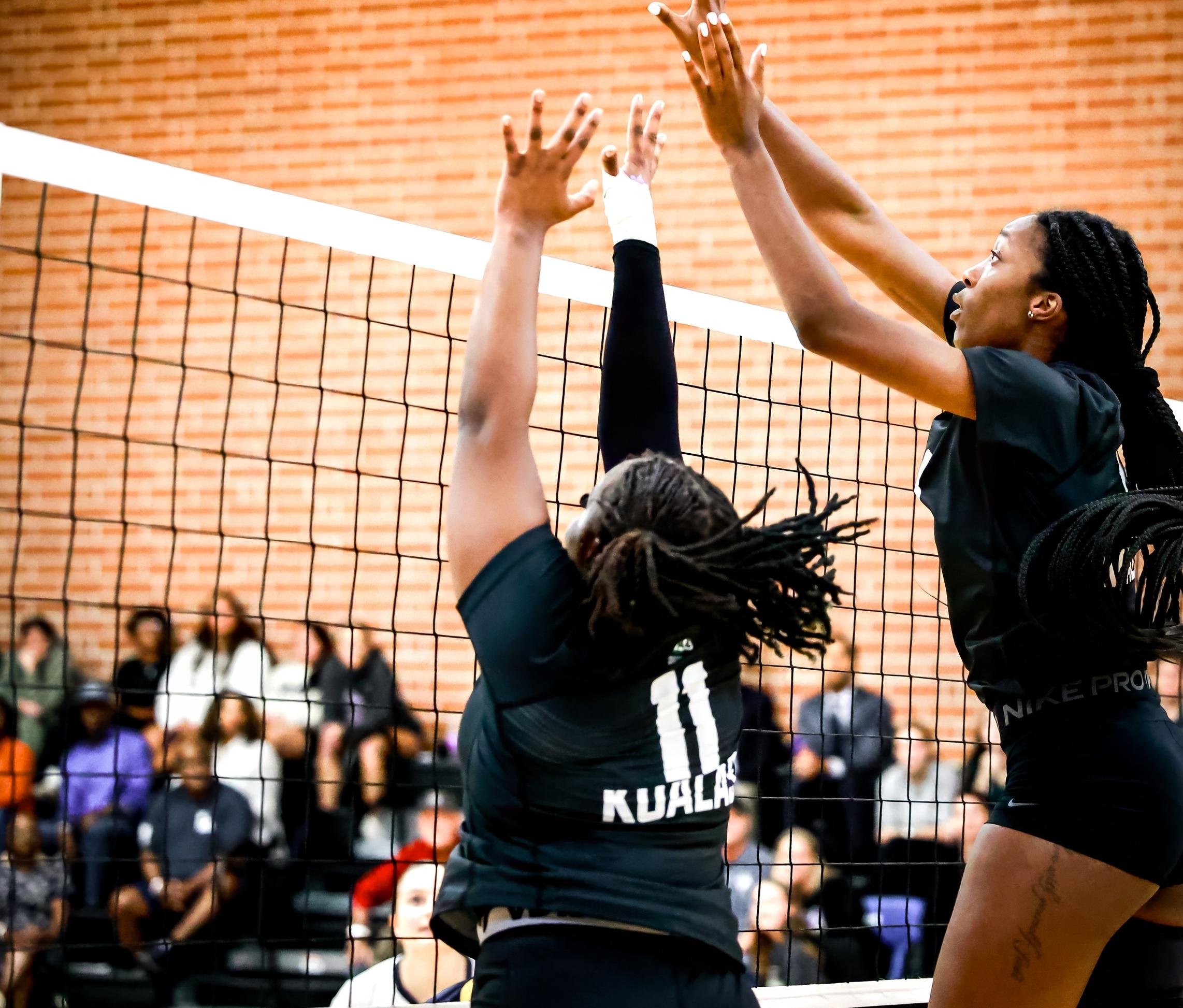 Middle Blockers Tamia Fripp and Destiny Brown. Photo courtesy of Hannsen Meneses
